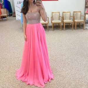 Sherri Hill hot pink strapless gown with beaded top